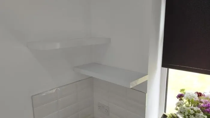 Corner wall shelves